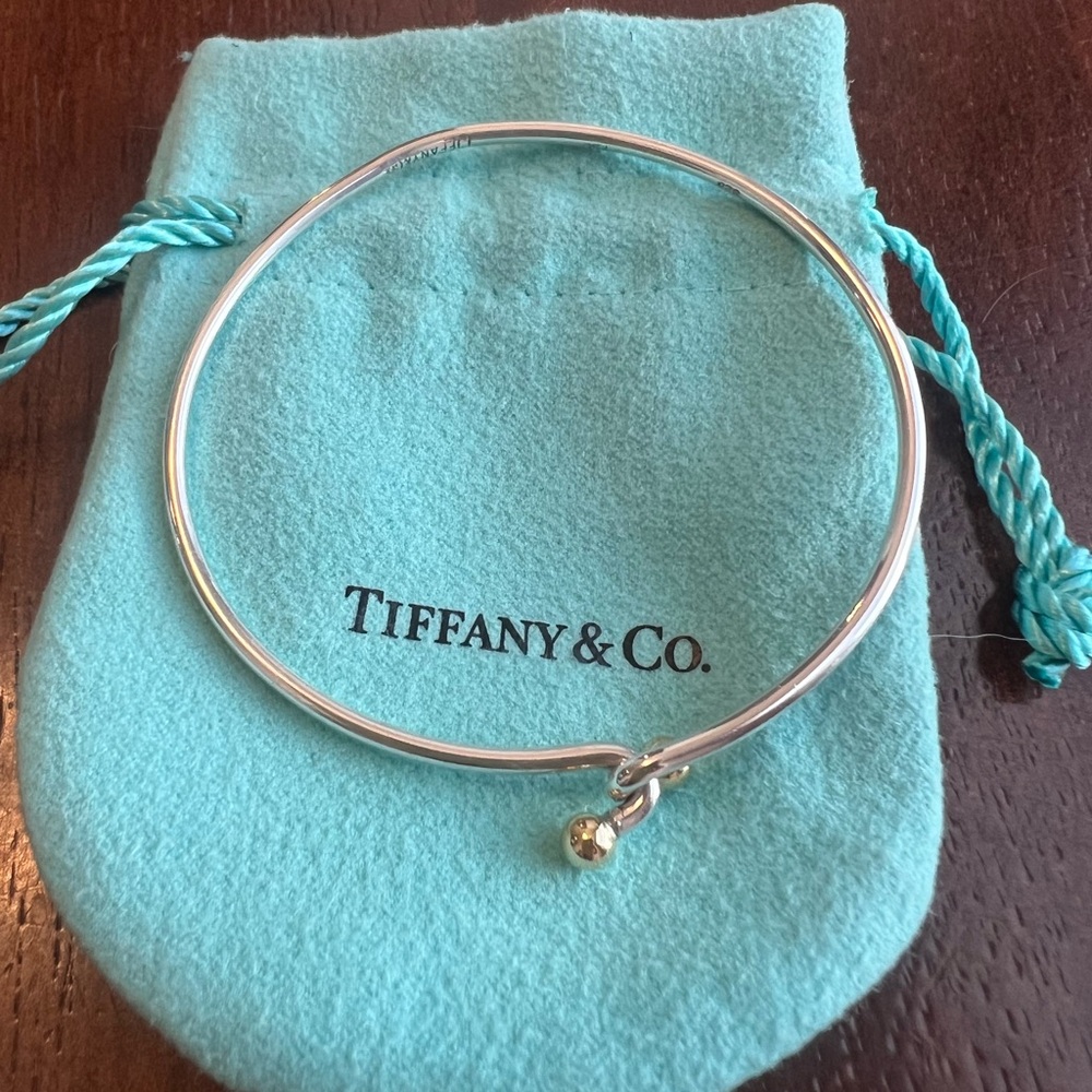 Tiffany & Co silver wire bracelet with 18k gold hook ball fastener